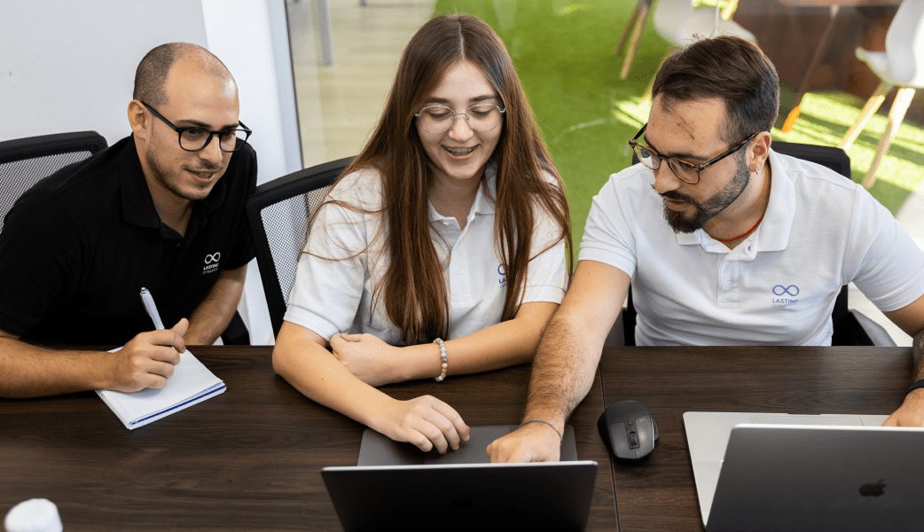 Lasting Dynamics team collaborating at the office